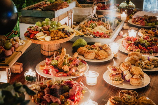 Catered buffet table set with seasonal dishes for a holiday party